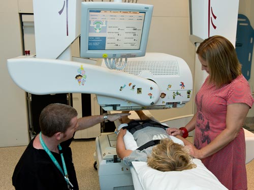 photo of a child on a nuclear medicine bed 