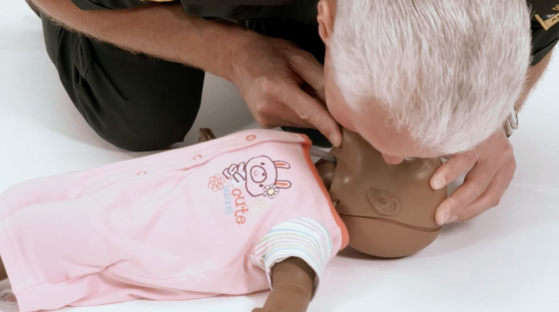 Screenshot from st johns video showing breathing during CPR 