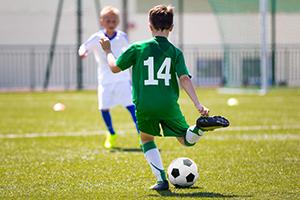 Children playing soccer