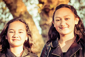 Two girls smiling